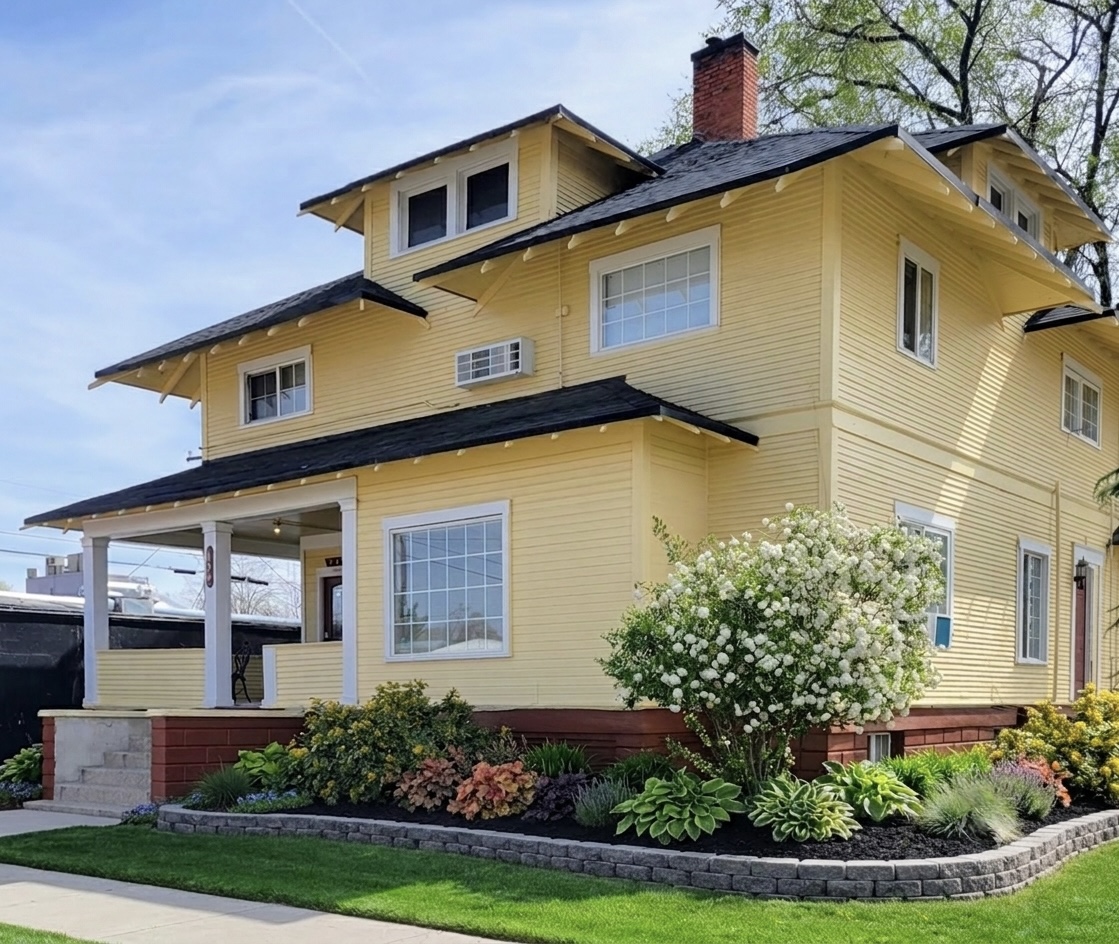 Rising Sun Caldwell yellow two-story craftsman home